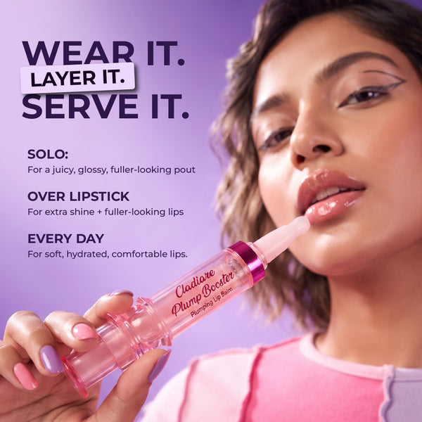 Woman applying Cladiare Plump Booster lip balm for a glossy, plump pout
